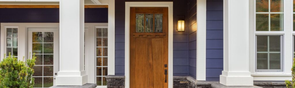 Wood Front Door With Blue Siding